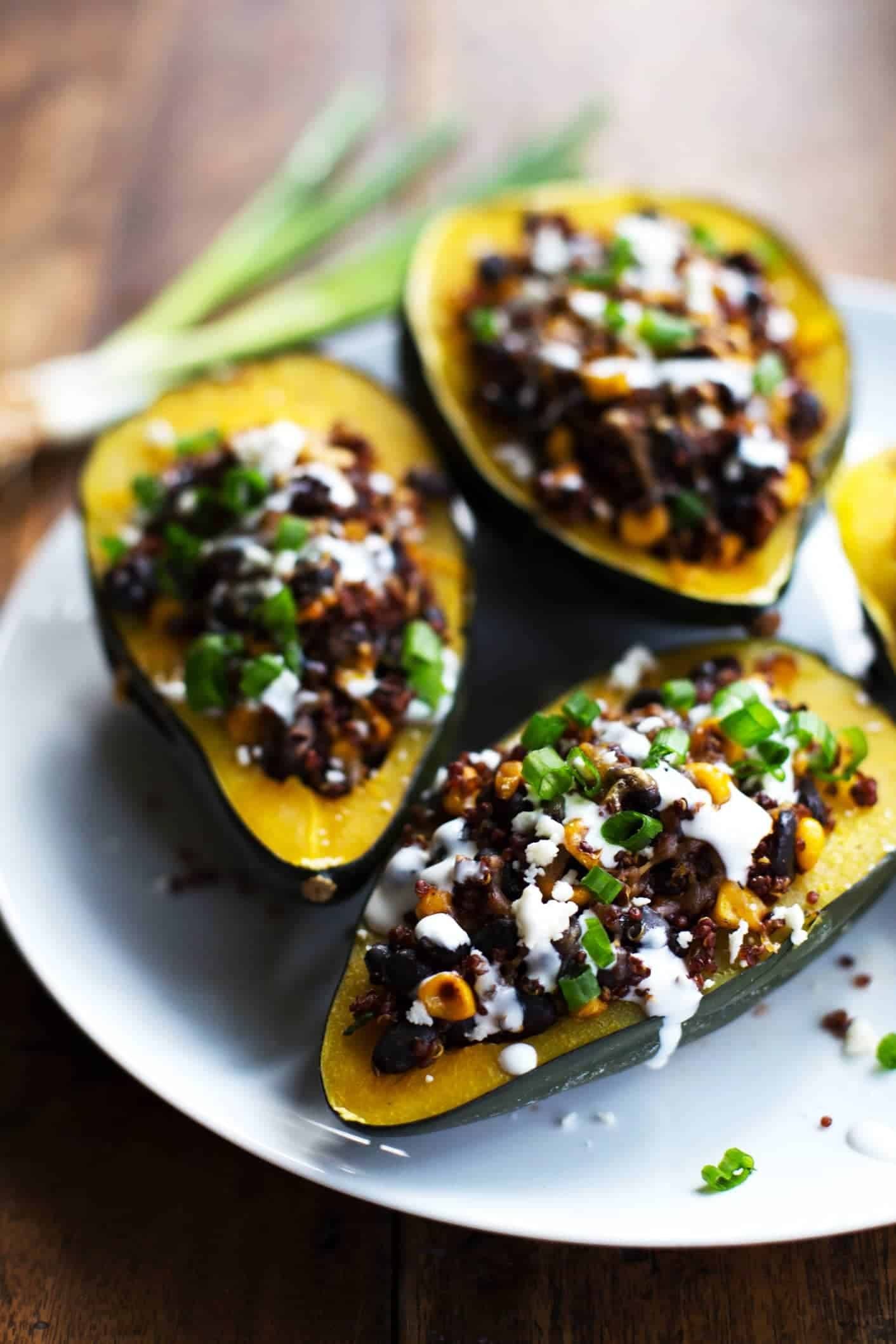 Mexican Roasted Corn and Quinoa Stuffed Squash on a plate.