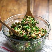 Spring Quinoa Salad with Honey Lemon Vinaigrette - peas, bacon, fresh herbs, almonds. Serve on spinach for fresh take-to-work lunches! | pinchofyum.com