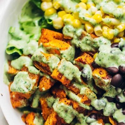 Spicy Southwestern Salad in a bowl with avocado dressing.