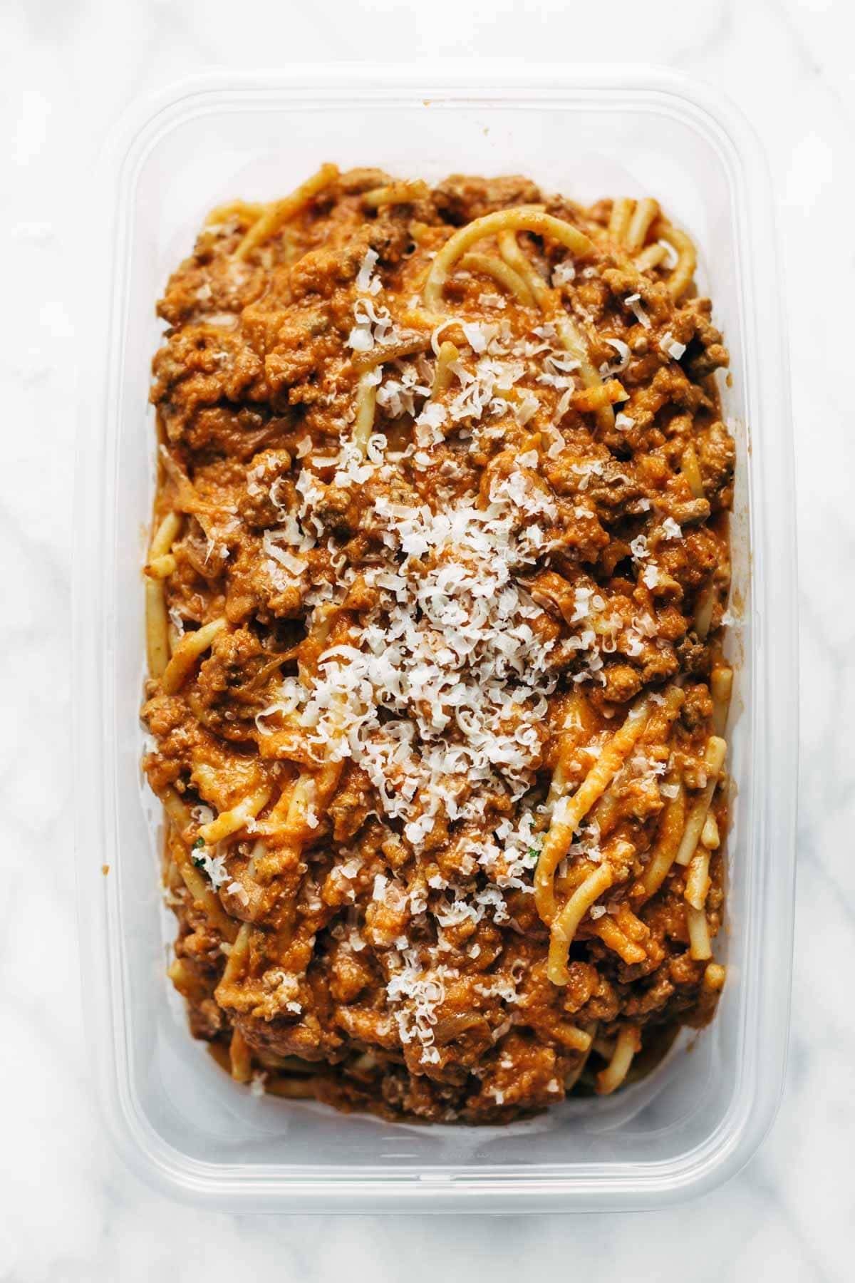 Creamy Pumpkin Spaghetti with Garlic Kale - this is the most crazy good combination! Spicy turkey, creamy pumpkin sauce, and pasta! | pinchofyum.com