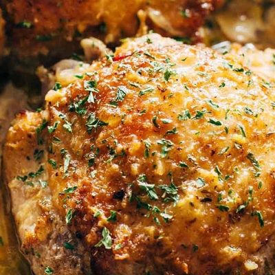 Skillet Turkey with Bacon and White Wine in a pan.