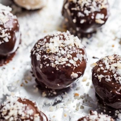 Dark Chocolate Coconut Bites with coconut sprinkled on.