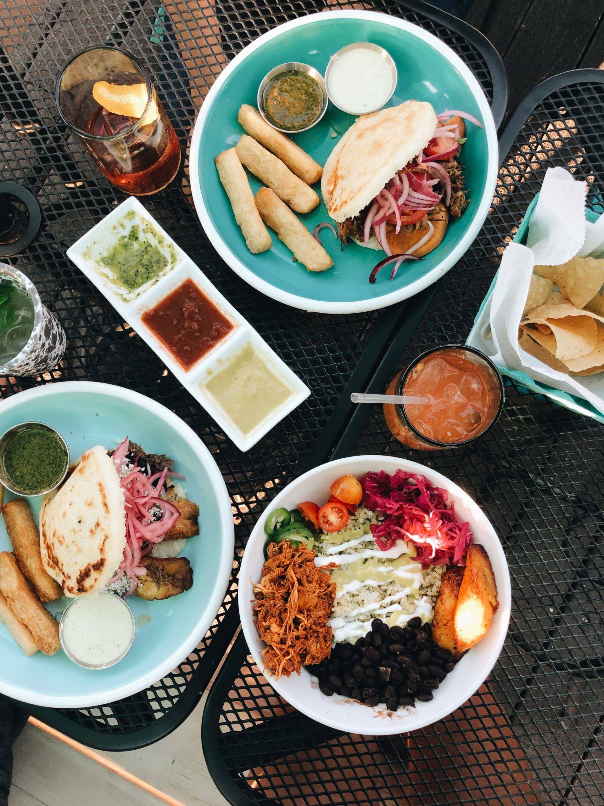 Several dishes on a restaurant table.