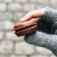 Lindsay holding a macaron.