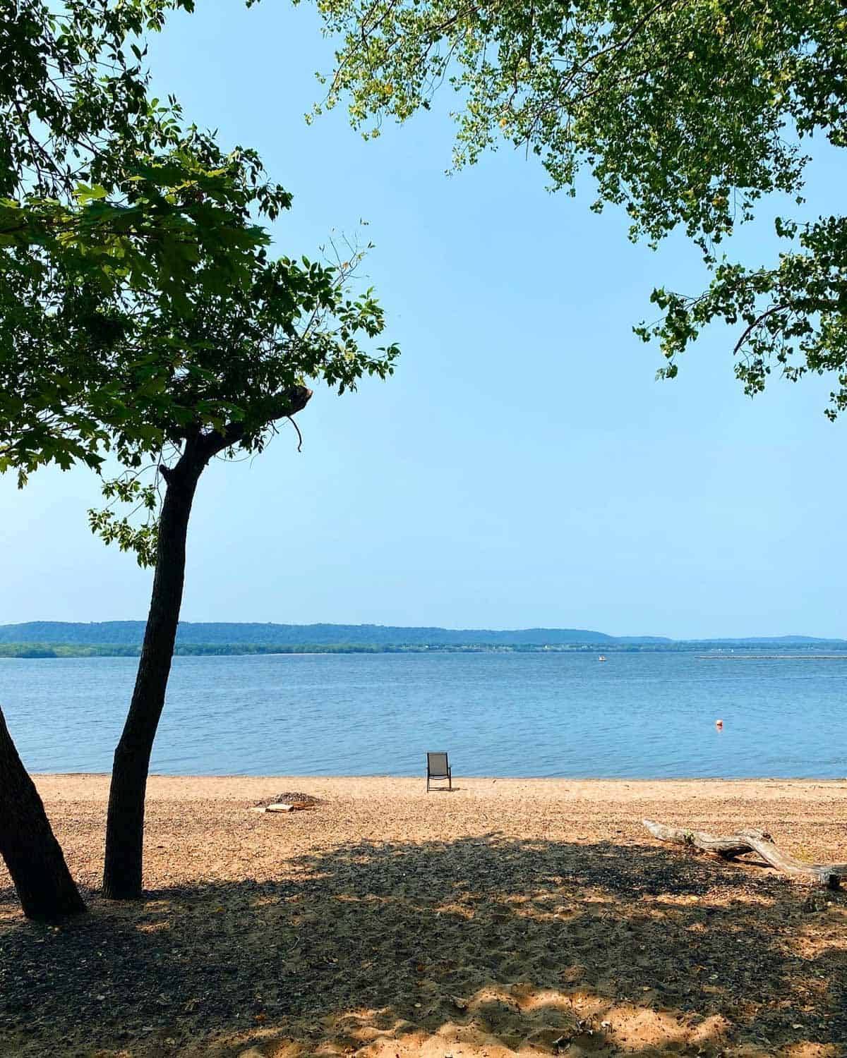 A chair sitting on a beach.