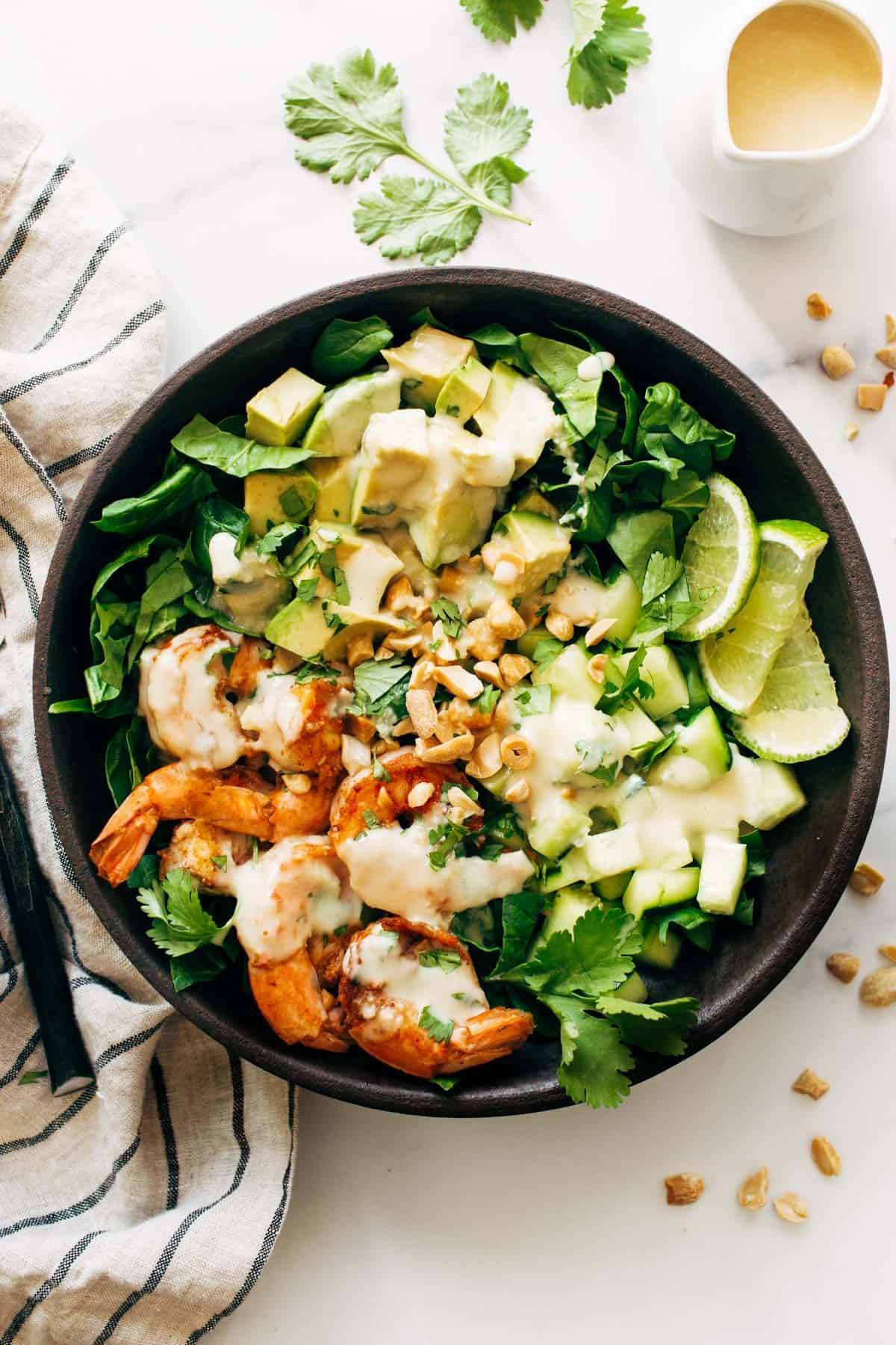 Shrimp and Avocado Salad with Miso Dressing in a Bowl.