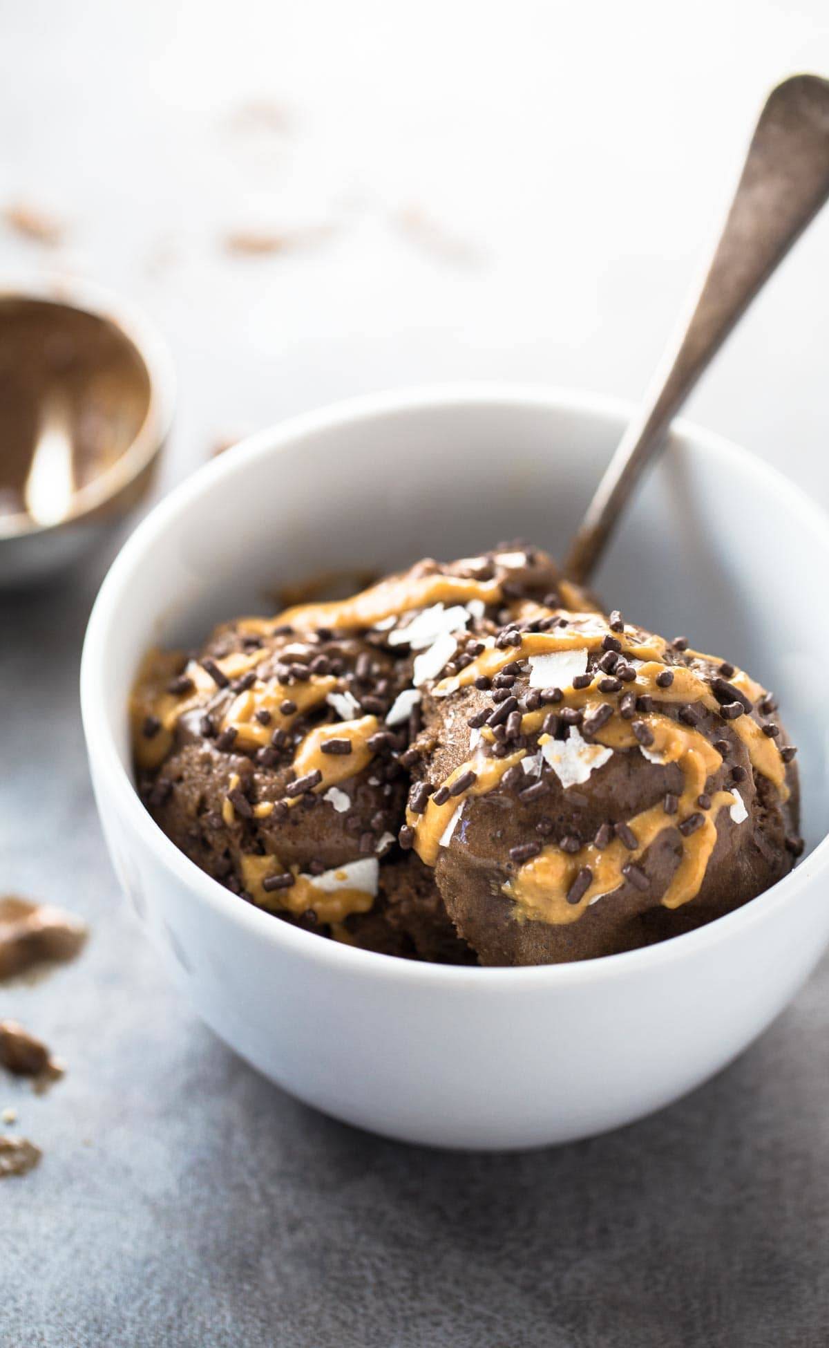 This naturally sweet ice cream is made with ALOHA superfood chocolate and bananas! You won't believe it's only 3 ingredients and 5 minutes to make! | pinchofyum.com
