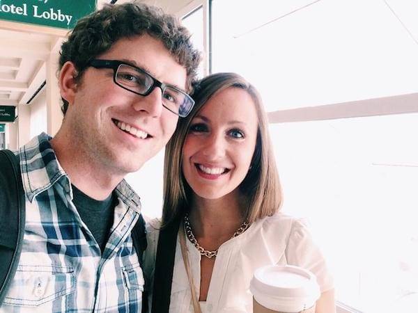 Man and woman smiling.