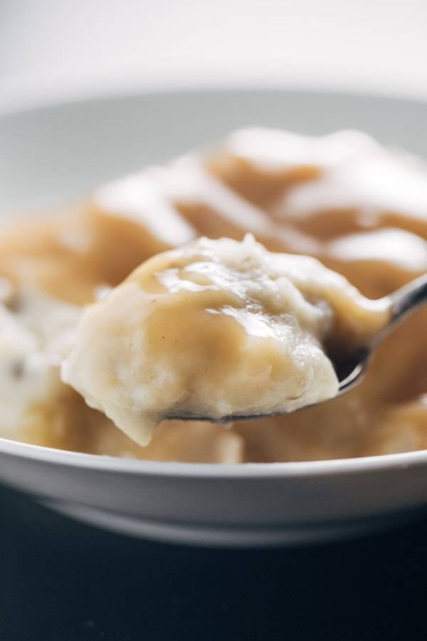 Garlic Mashed Potatoes on a spoon.